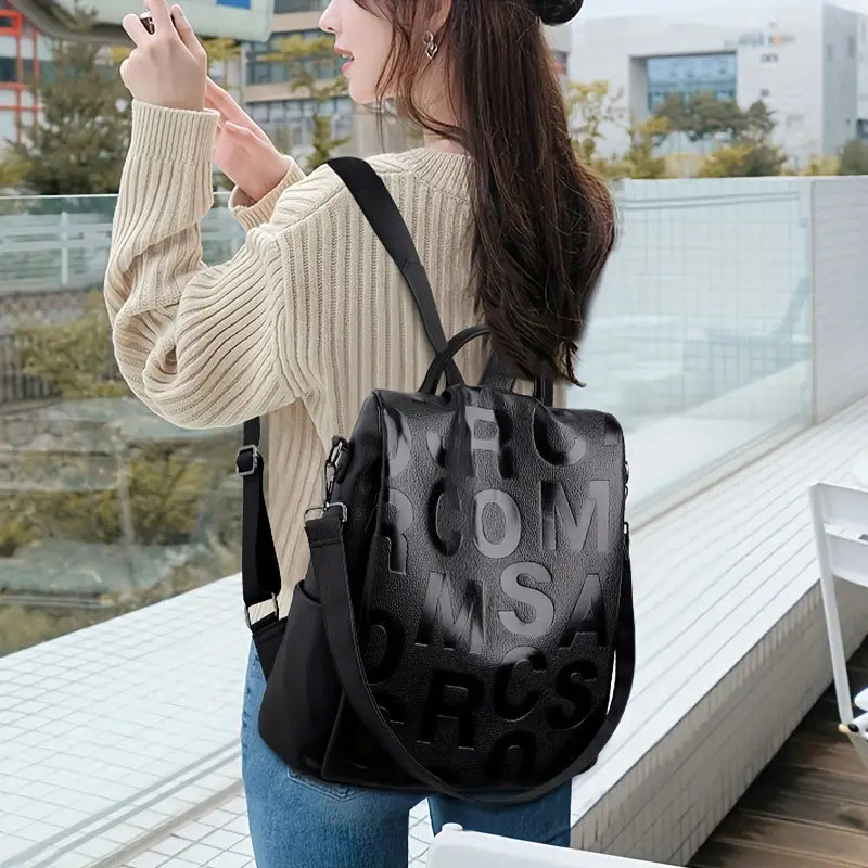 Fashion-Forward Letter Embossed Backpack - Solid Color